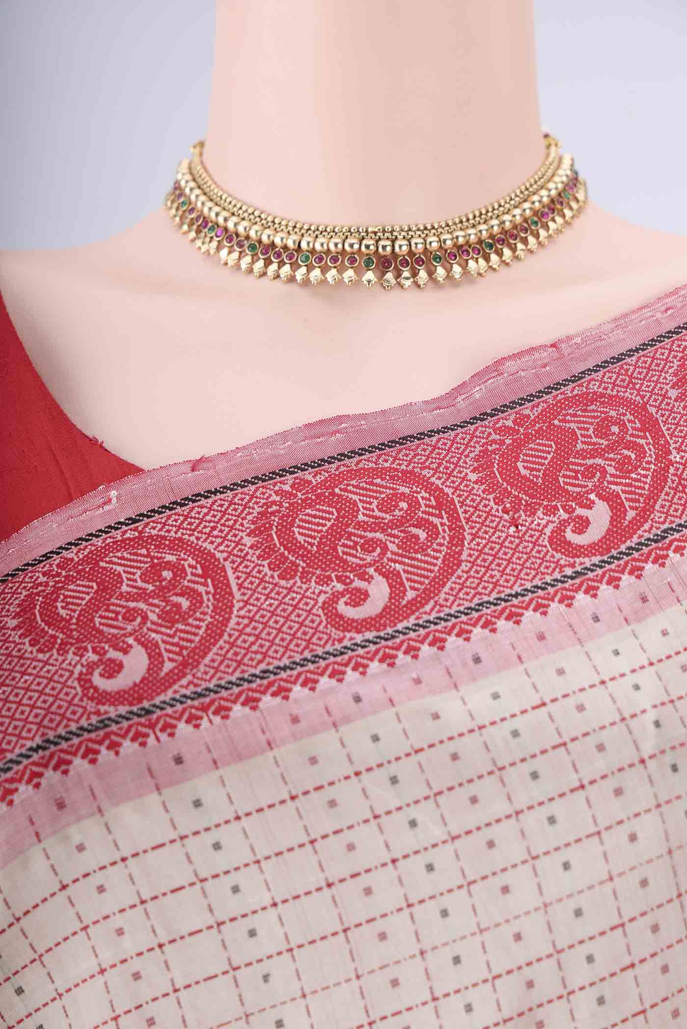 Border image of Beige Blended Poly Cotton Saree with Checked design on the body and Thread Border. 