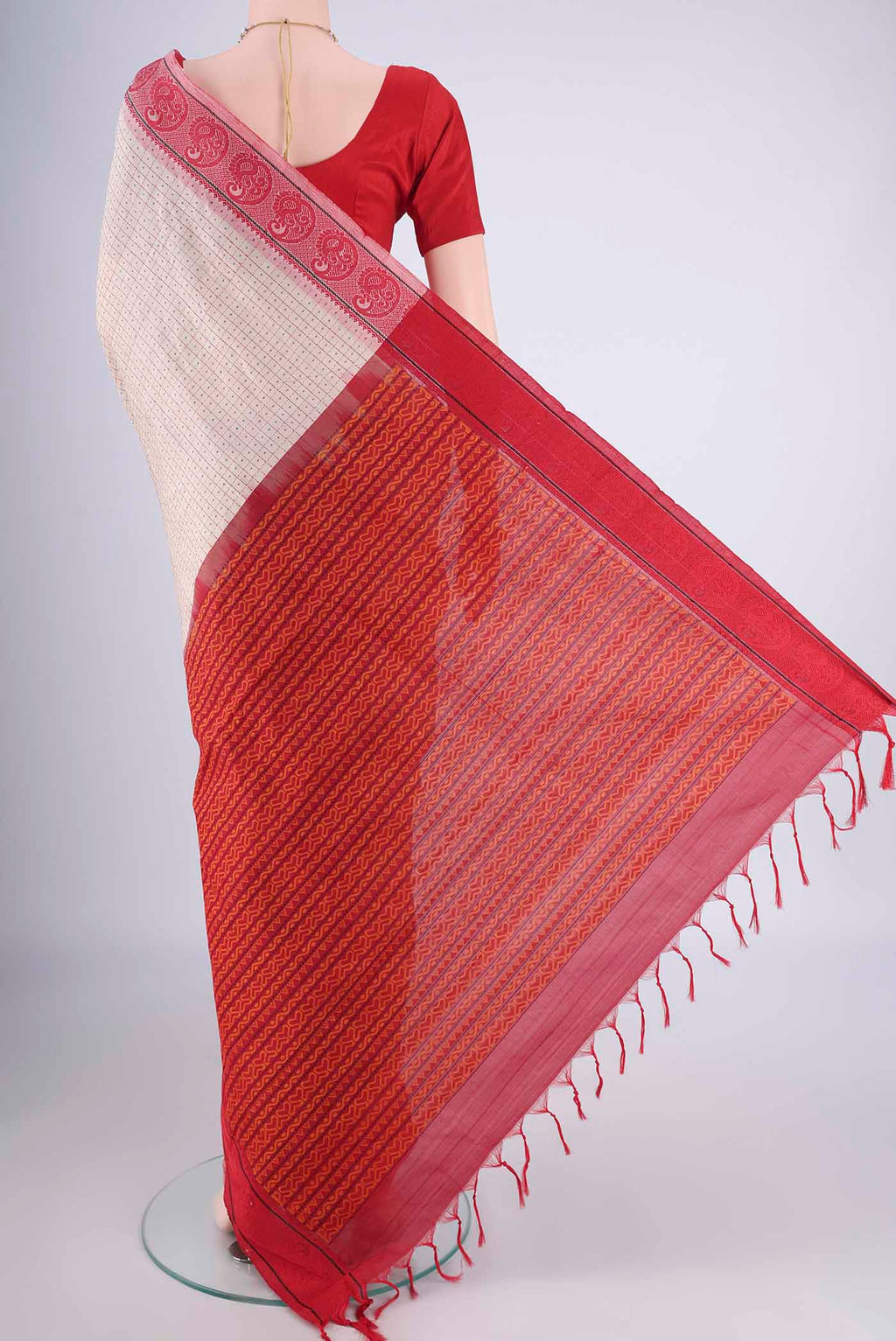 Flat view of Beige Blended Poly Cotton Saree with Checked design on the body and Thread Border. 