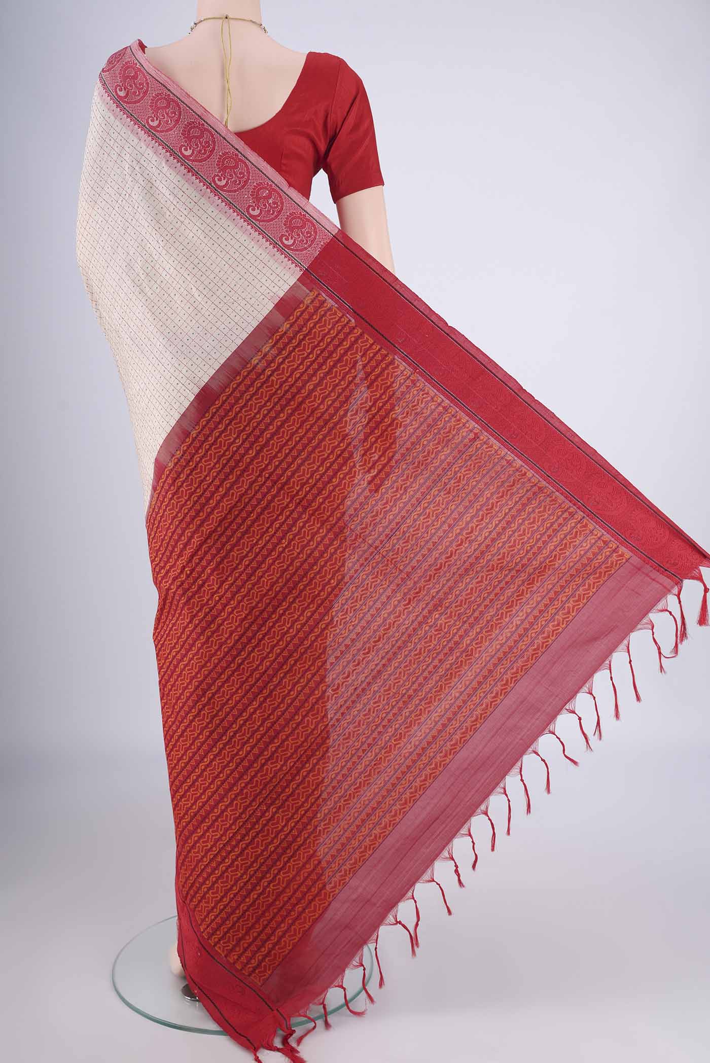 Flat view of Beige Blended Poly Cotton Saree with Checked design on the body and Thread Border. 