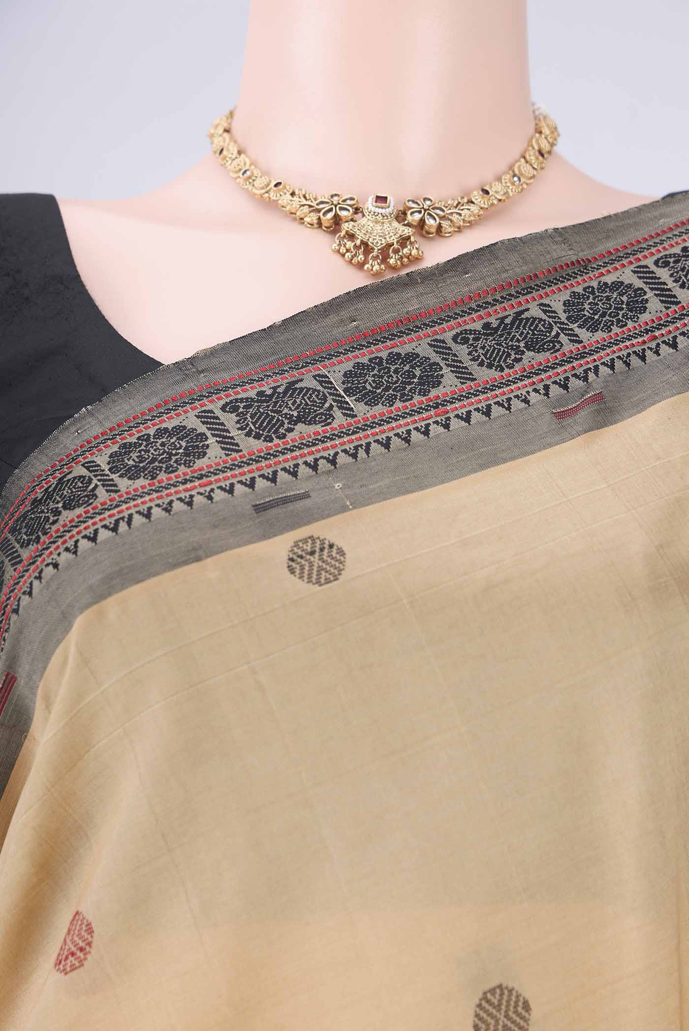 Border image of Dark Beige Blended Poly Cotton Saree with Thread Butta on the body and Thread Border. 