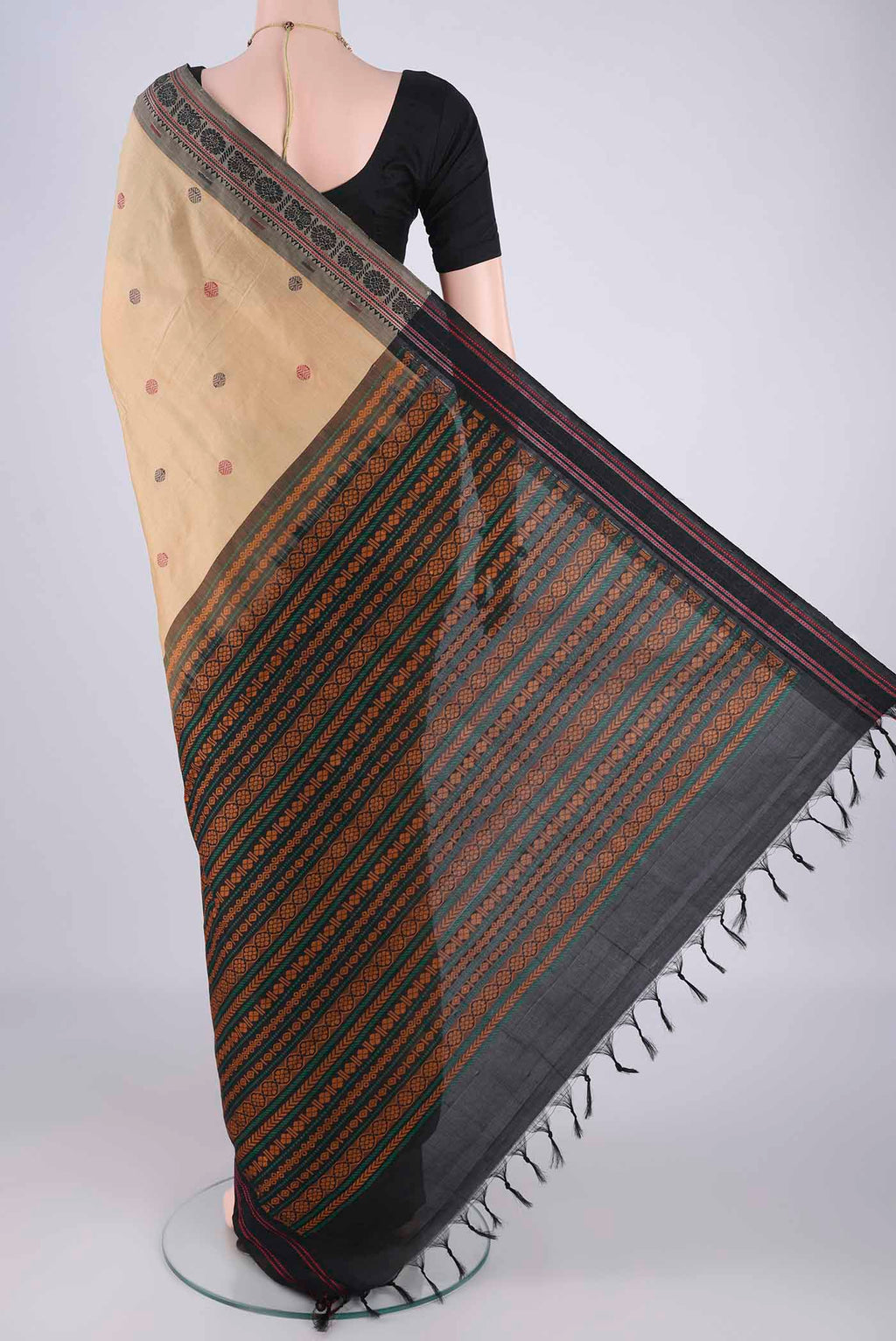 Flat view of Dark Beige Blended Poly Cotton Saree with Thread Butta on the body and Thread Border. 