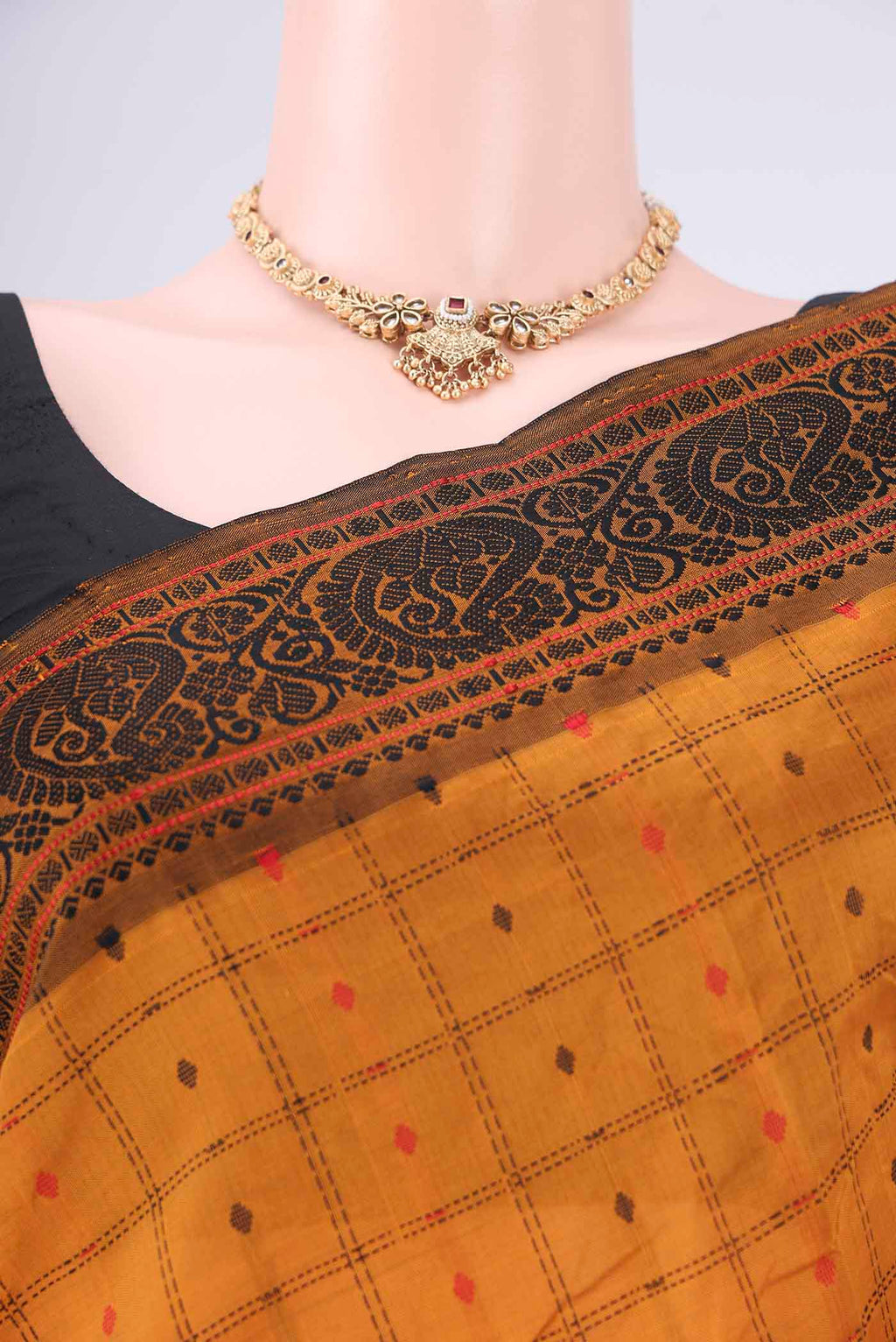 Border image of Mustard Blended Poly Cotton Saree with Checked design on the body and Thread Border. 