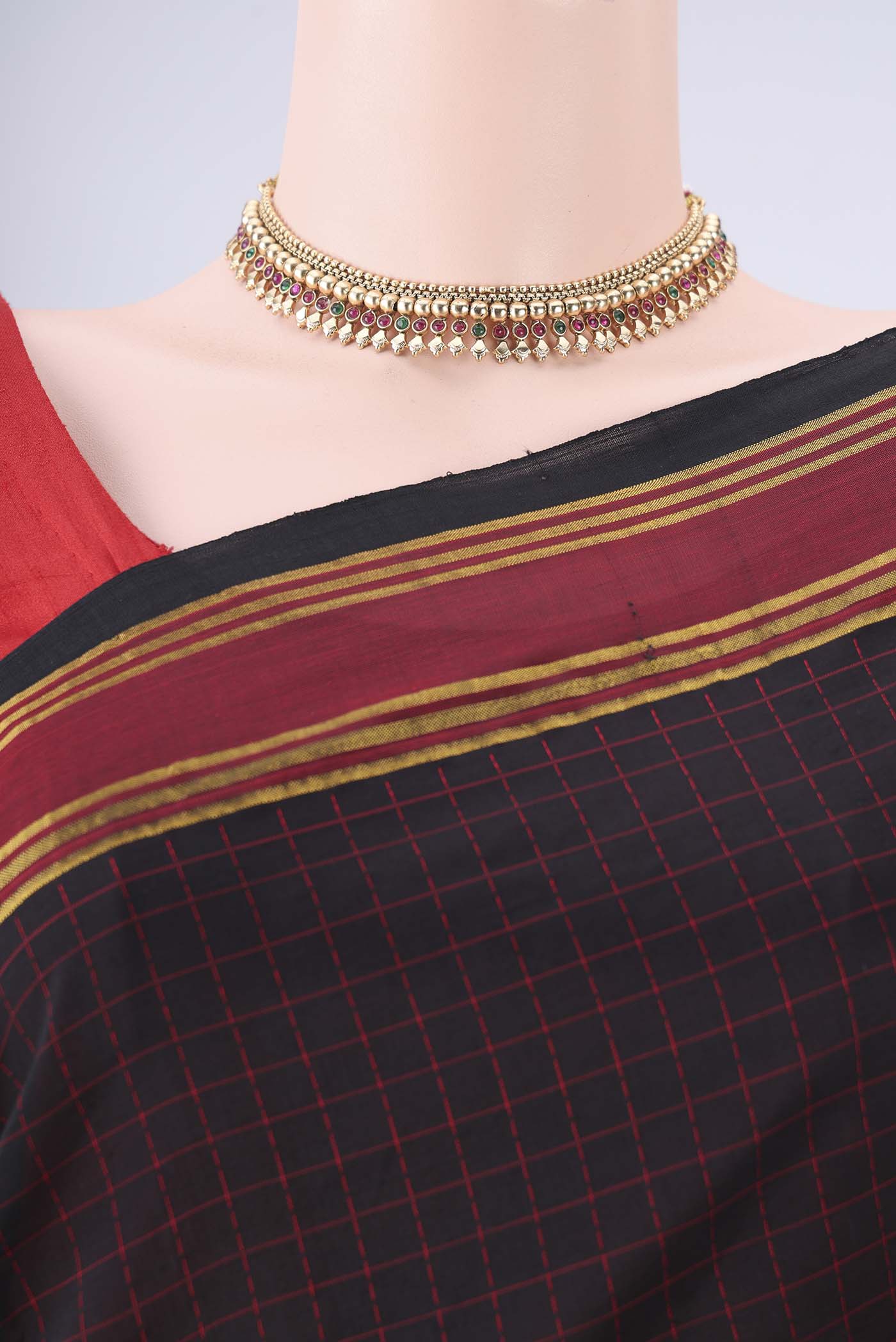 Border image of Black Blended Poly Cotton Saree with Checked design on the body and Thread Border. 