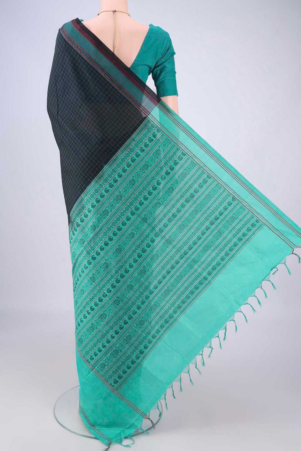 Flat view of Black Blended Poly Cotton Saree with Checked design on the body and Thread Border. 