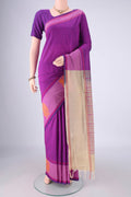 Purple Blended Poly Cotton Saree with Checked design on the body and Plain Border.  displayed on a mannequin