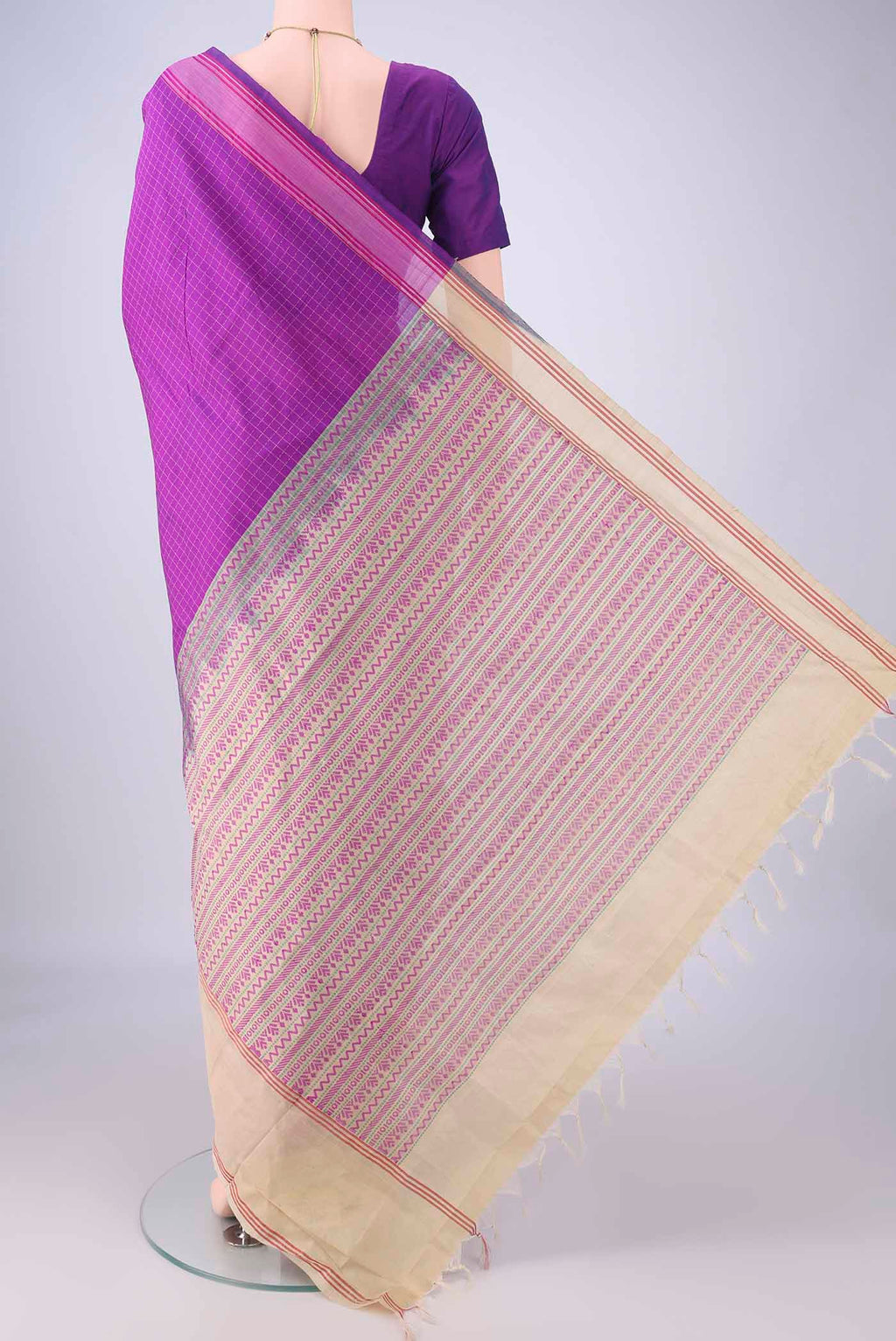Flat view of Purple Blended Poly Cotton Saree with Checked design on the body and Plain Border. 