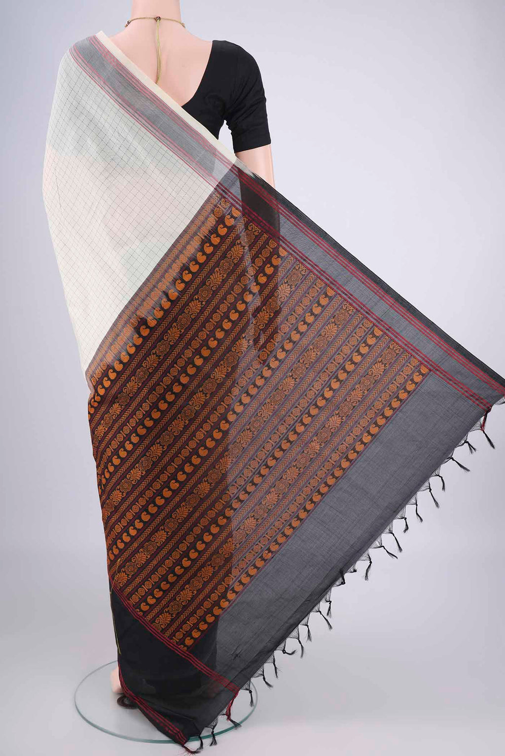 Flat view of Off White Blended Poly Cotton Saree with Checked design on the body and Thread Border. 