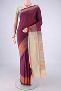 Maroon Blended Poly Cotton Saree with Checked design on the body and Plain Border.  displayed on a mannequin