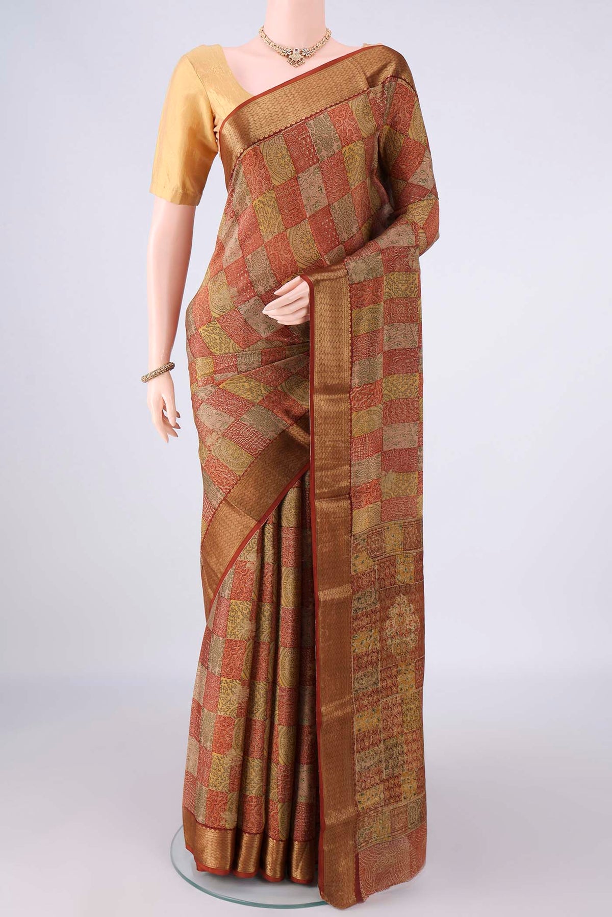 Multi Color Mysore Crepe Saree with Printed design on the body and Zari Border.  displayed on a mannequin
