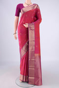 Pink Kanchipuram Silk Saree with Zari Butta on the body and Zari Border.  displayed on a mannequin