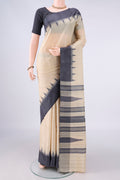 Beige MP Tussar Saree with Plain Body and Temple Border.  displayed on a mannequin