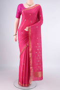 Rani Pink MP Tussar Saree with Zari Butta on the body and Zari Border.  displayed on a mannequin