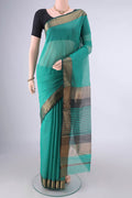 Sea Green Maheshwari Cotton Saree with Plain Body and Zari Border.  displayed on a mannequin