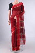 Maroon Maheshwari Cotton Saree with Plain Body and Zari Border.  displayed on a mannequin