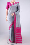 Grey Kanjivaram Silk Saree with Plain Body and Thread Border.  displayed on a mannequin