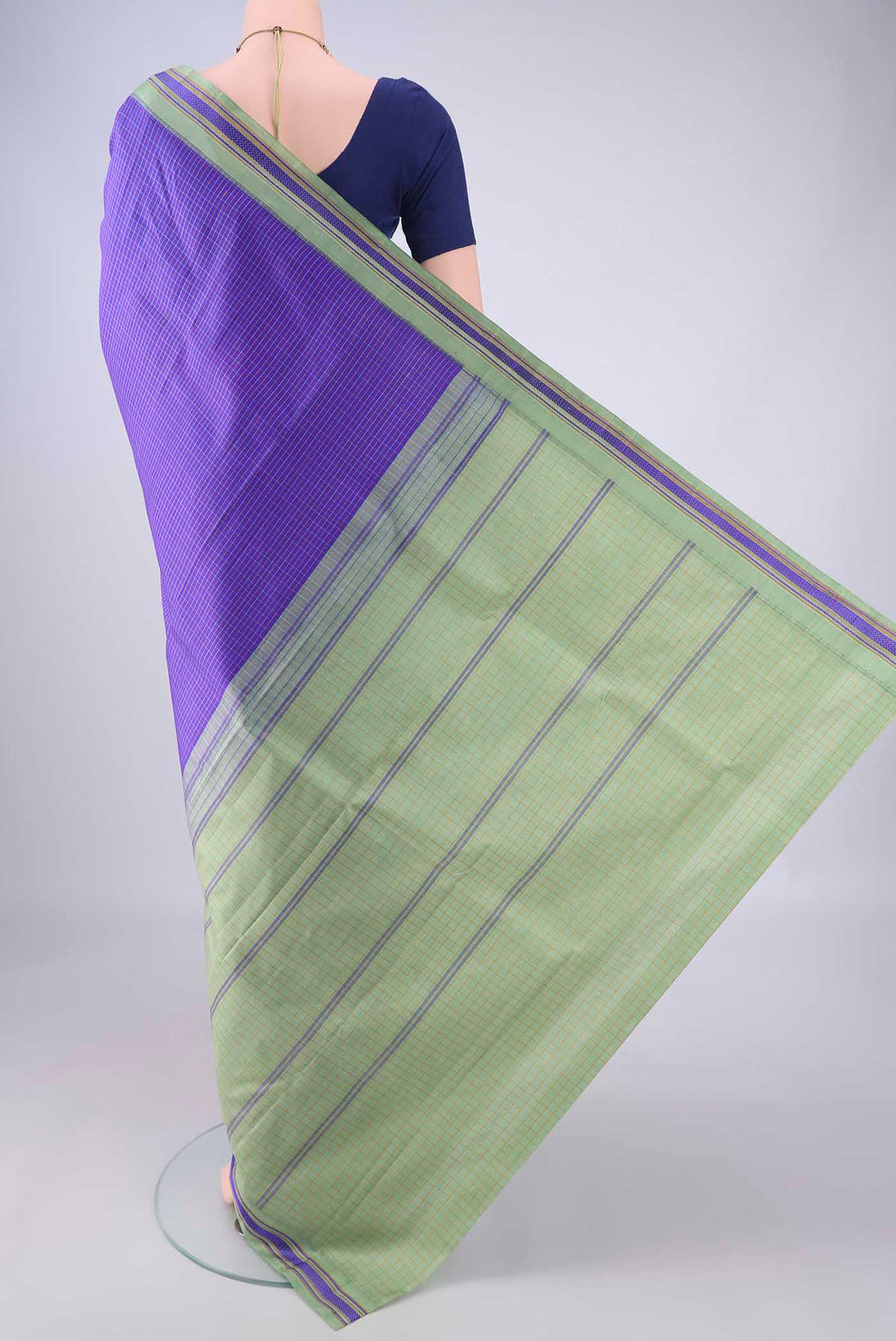 Flat view of Violet Kanjivaram Silk Saree with Checked design on the body and Thread Border. 