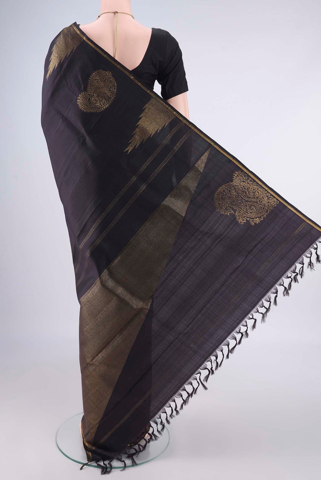 Flat view of Pure Silk Pure Zari Black Kanchipuram Saree with Plain Body and Thin Zari Line. 