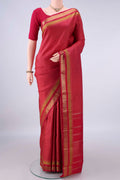 Pure Silk Pure Zari Red Kanchipuram Saree with Checked design on the body and Zari Border.  displayed on a mannequin