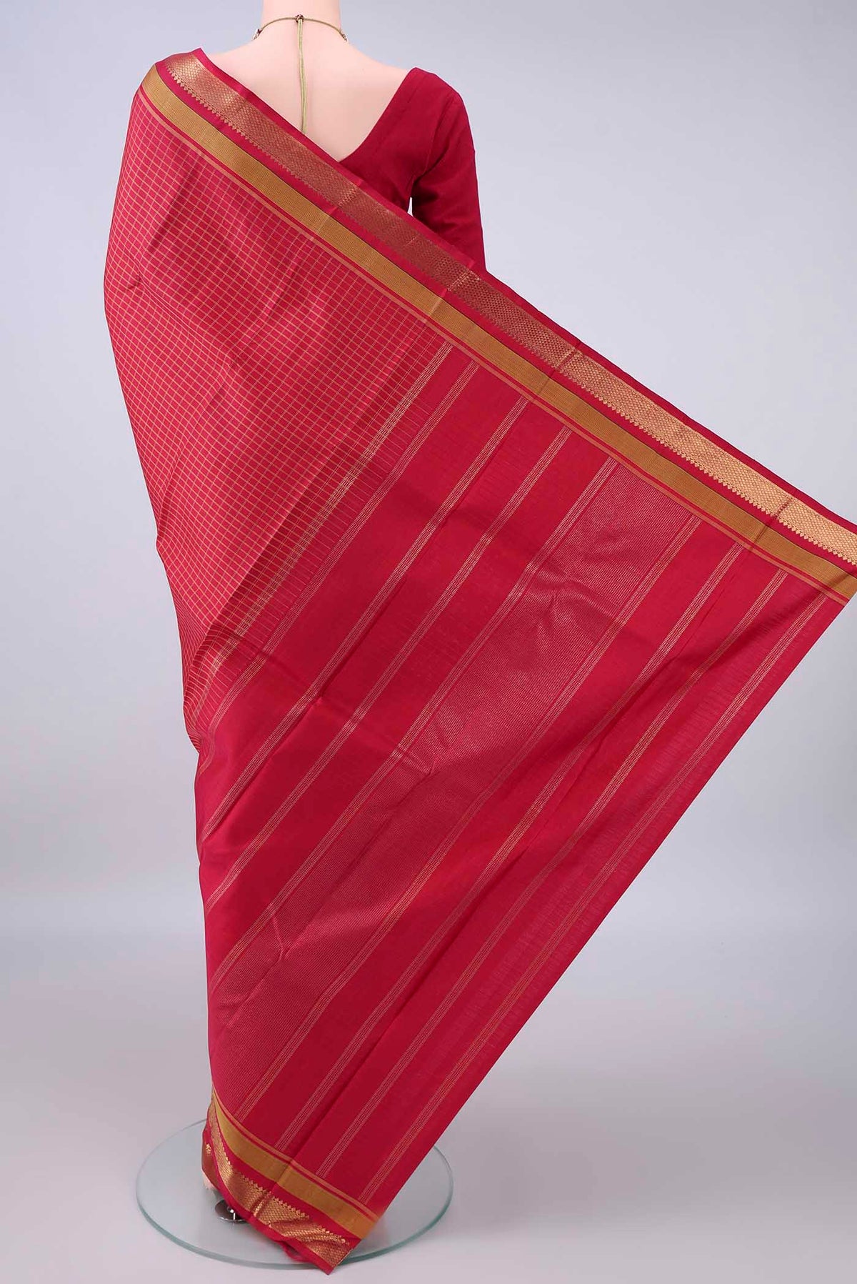 Flat view of Pure Silk Pure Zari Red Kanchipuram Saree with Checked design on the body and Zari Border. 