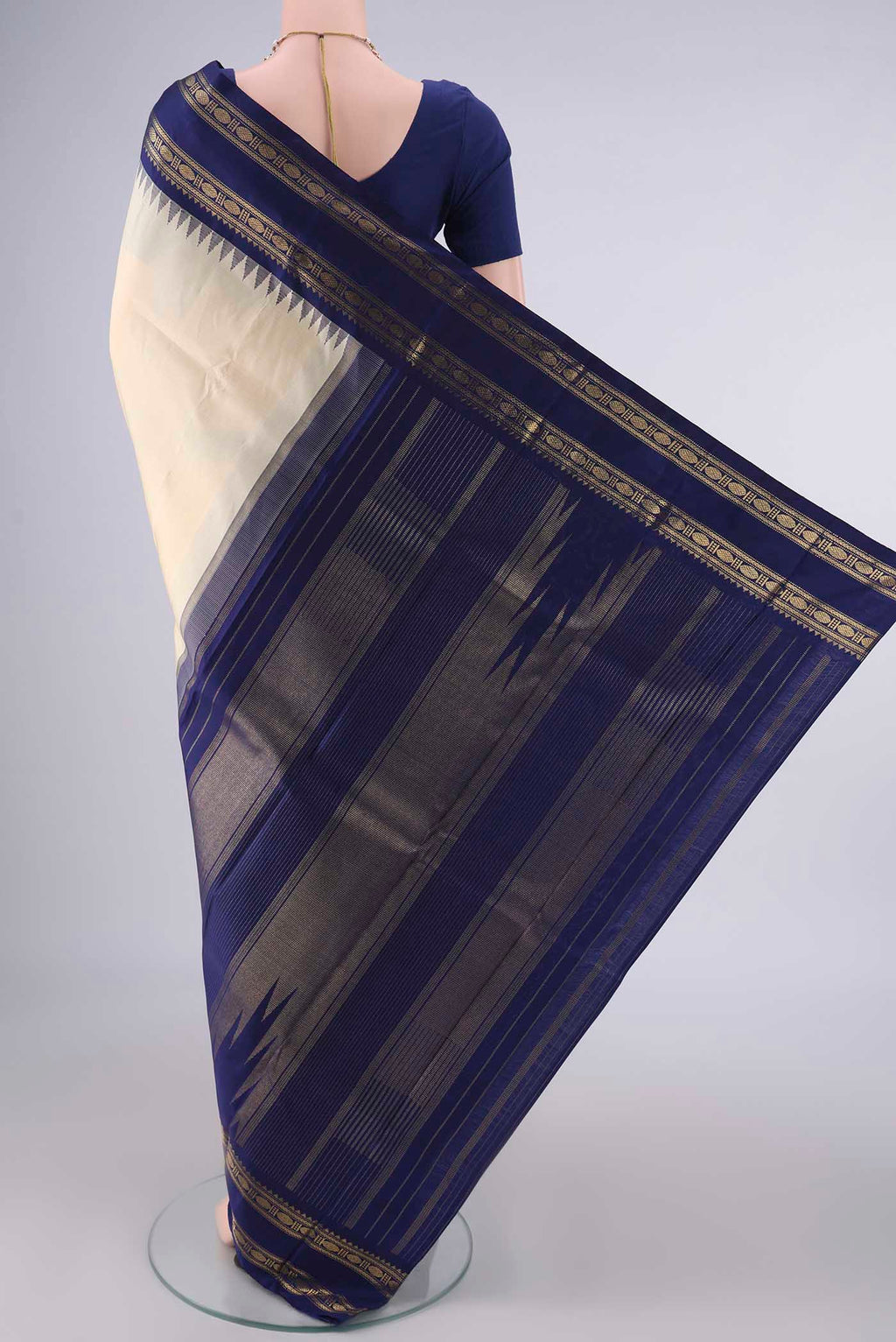 Flat view of Pure Silk Pure Zari Sandal Kanchipuram Saree with Plain Body and Temple Border. 