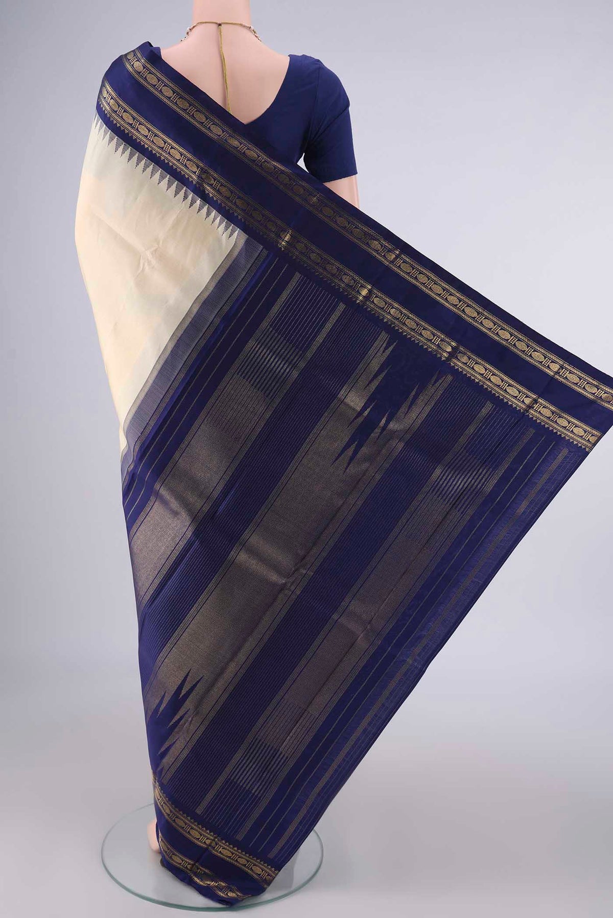 Flat view of Pure Silk Pure Zari Sandal Kanchipuram Saree with Plain Body and Temple Border. 
