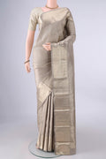 Pure Silk Grey Kanchipuram Saree with Zari Brocade on the body and Zari Border.  displayed on a mannequin