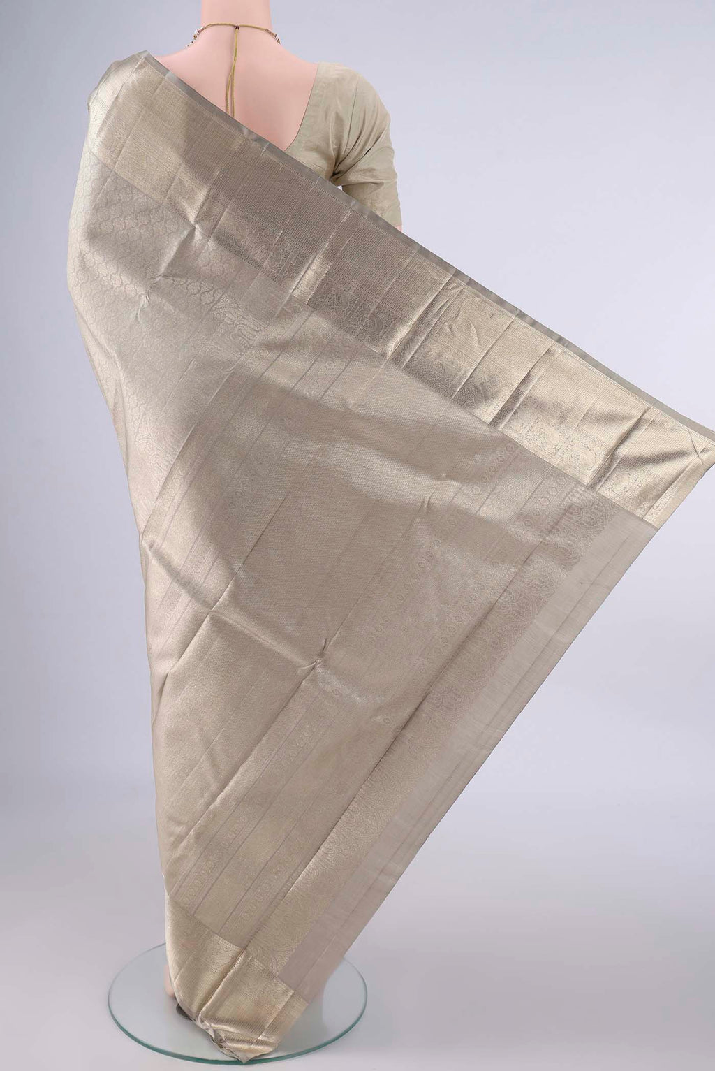 Flat view of Pure Silk Grey Kanchipuram Saree with Zari Brocade on the body and Zari Border. 