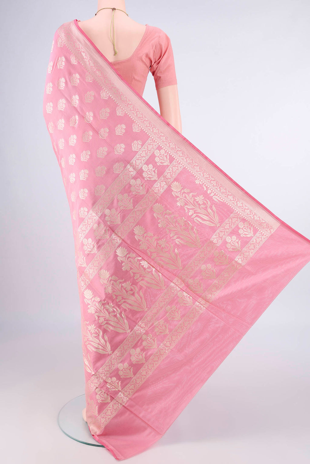 Flat view of Pure Silk Peach Banarasi Saree with Zari Butta on the body and Zari Border. 