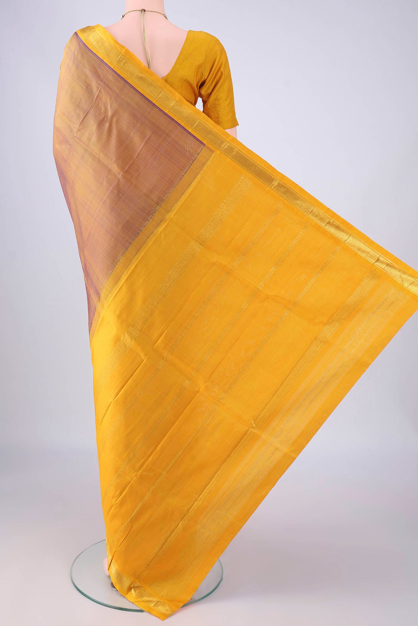 Flat view of Pure Silk Bronze Dual Tone Kanjivaram Silk Saree with Plain Body and Zari Border. 