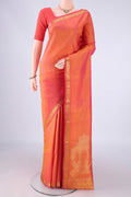 Pure Silk Brick Orange Kanjivaram Silk Saree with Plain Body and Zari Border.  displayed on a mannequin
