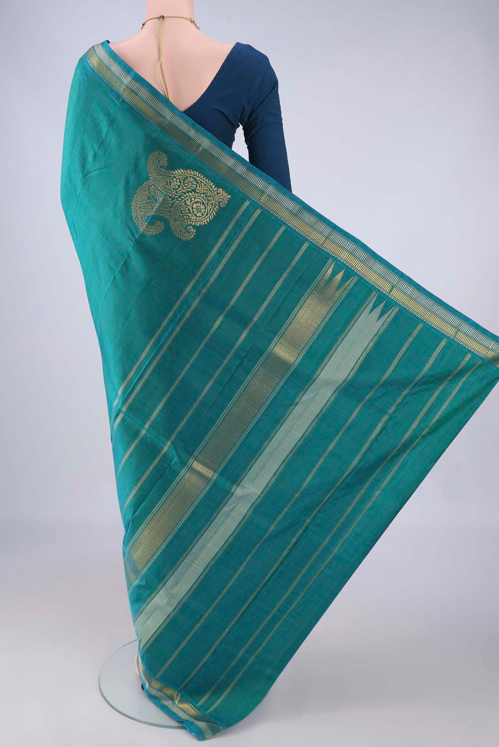 Flat view of Sea Green Kanchipuram Silk Saree with Plain Body and Zari Border. 