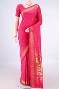 Pure Silk Rani Pink Paithani Saree with Plain Body and Zari Border.  displayed on a mannequin