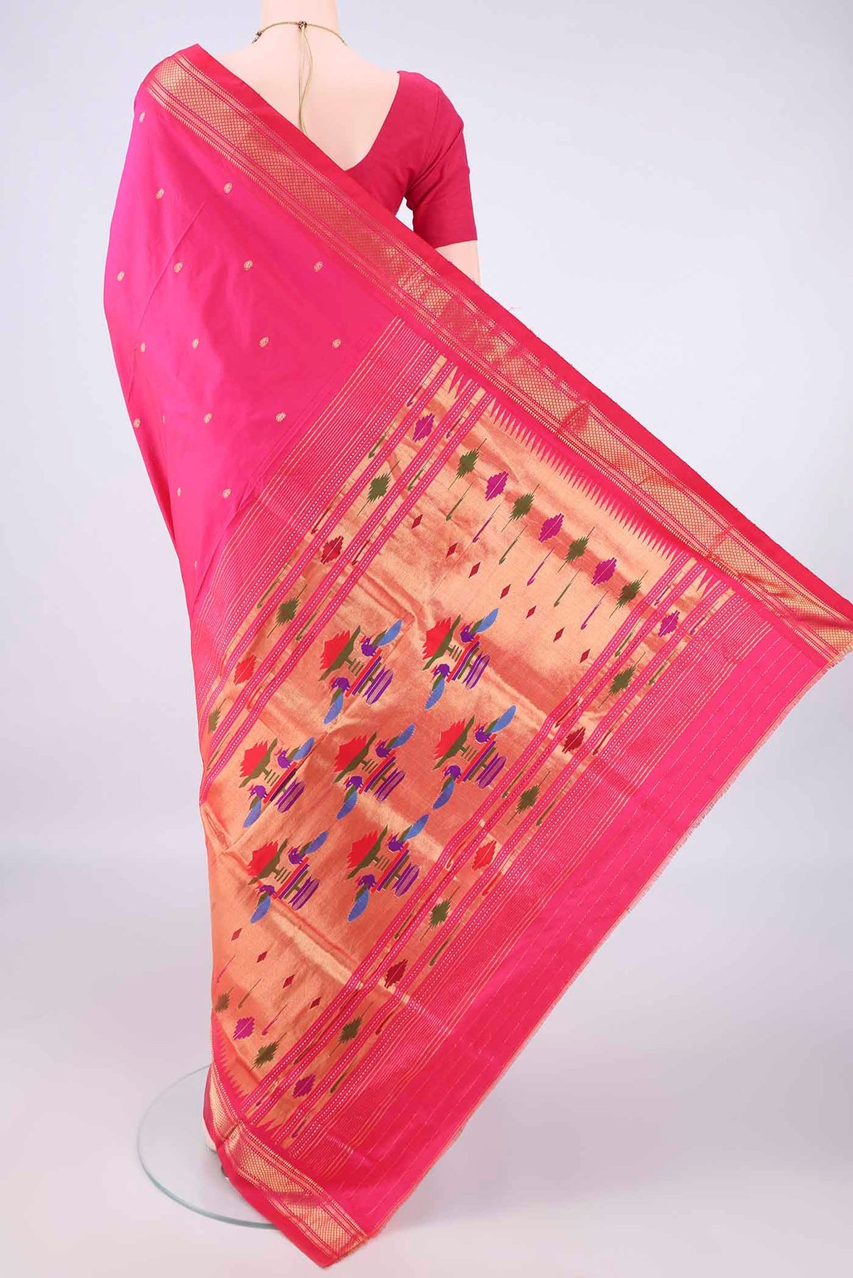 Flat view of Pure Silk Rani Pink Paithani Saree with Plain Body and Zari Border. 