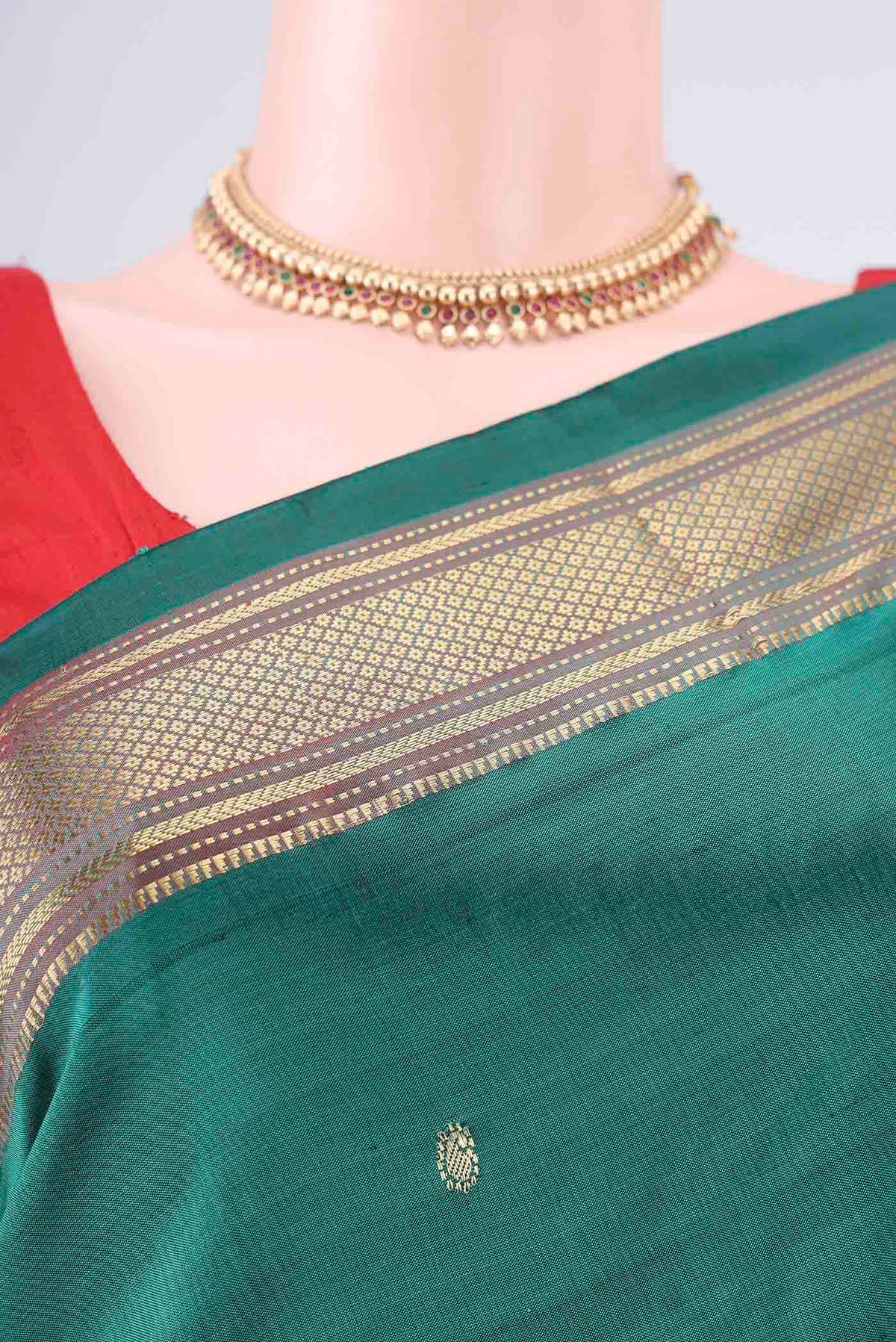 Border image of Pure Silk Bottle Green Paithani Saree with Plain Body and Zari Border. 