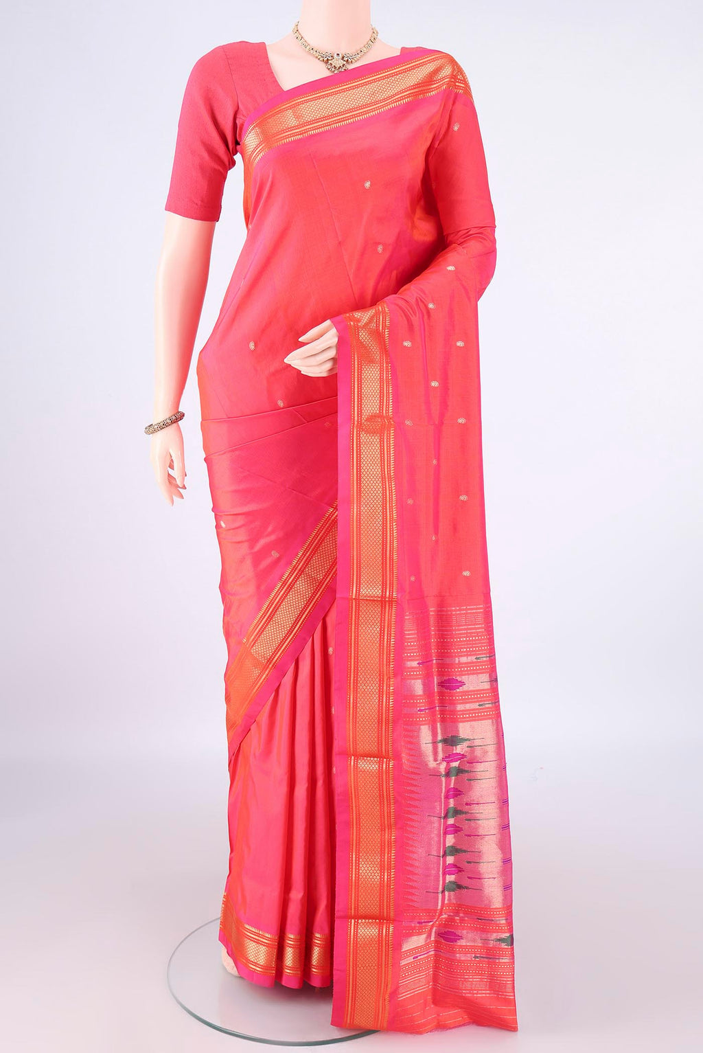 Pure Silk Imperial Pink Paithani Saree with Plain Body and Zari Border.  displayed on a mannequin