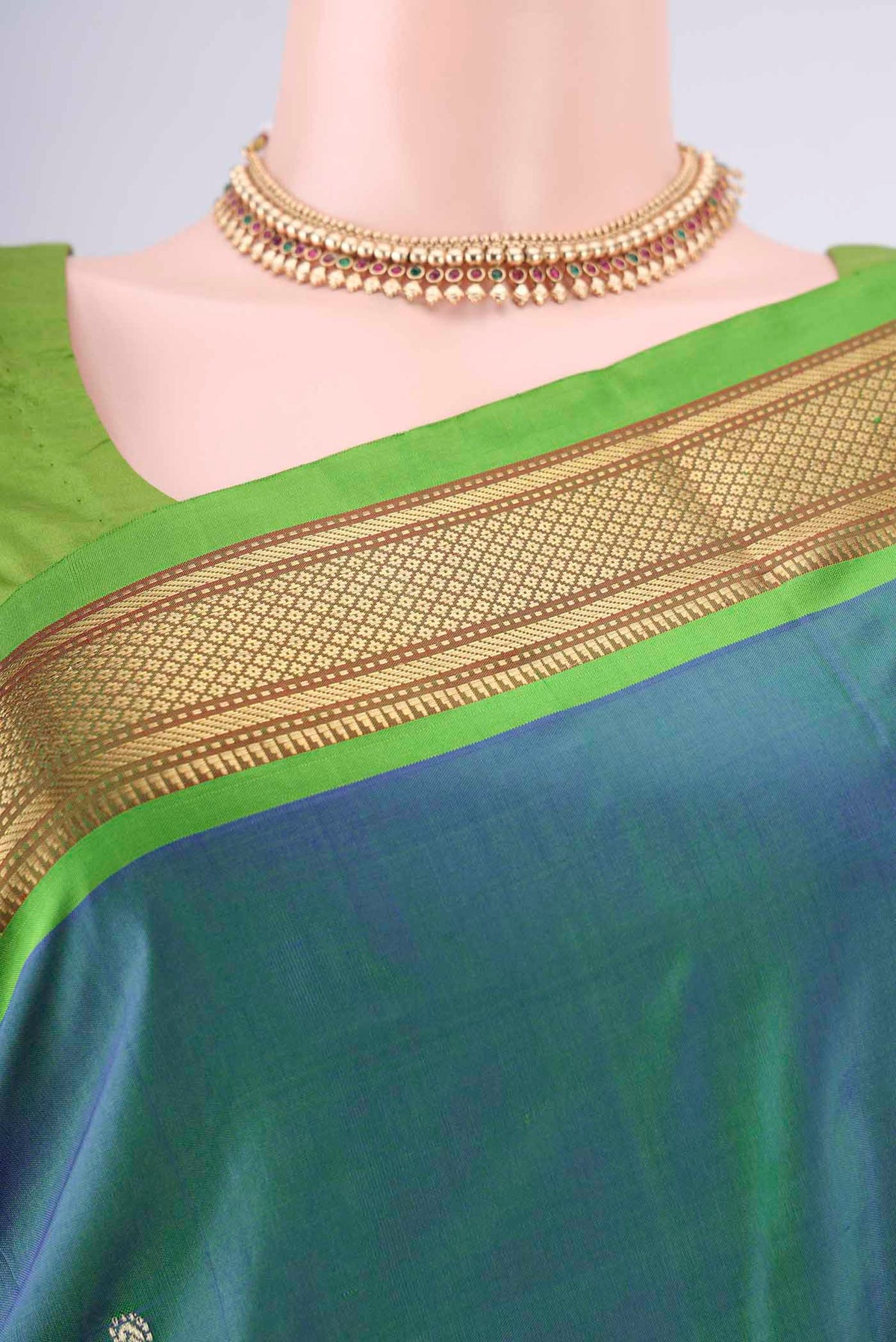 Border image of Pure Silk Peacock Blue Paithani Saree with Plain Body and Zari Border. 