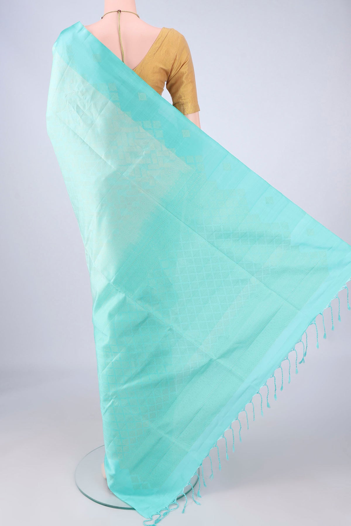 Flat view of Pure Silk Turquoise Soft Silk Saree with Zari Brocade on the body and Zari Border. 