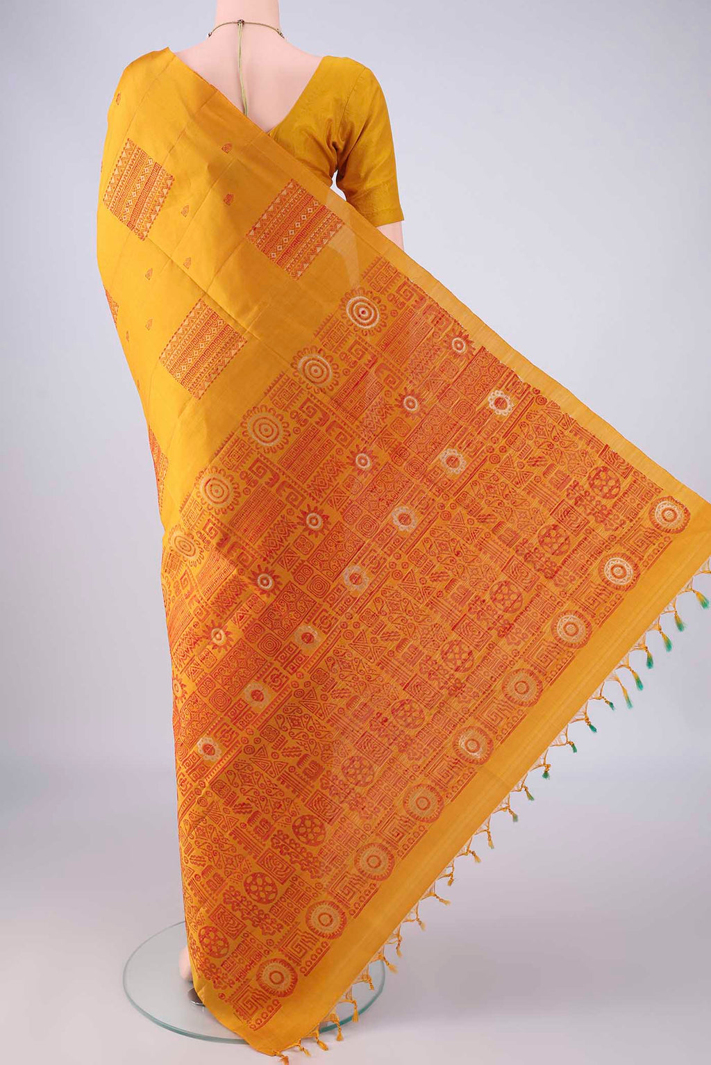 Flat view of Pure Silk Mustard Soft Silk Saree with Thread Butta on the body and Plain Border. 