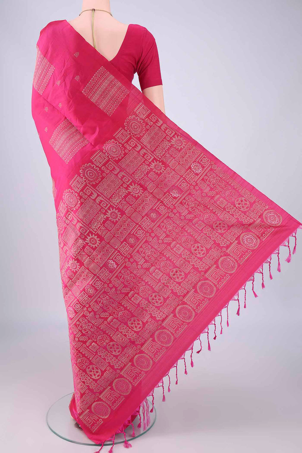 Flat view of Pure Silk Rani Pink Soft Silk Saree with Thread Butta on the body and Plain Border. 