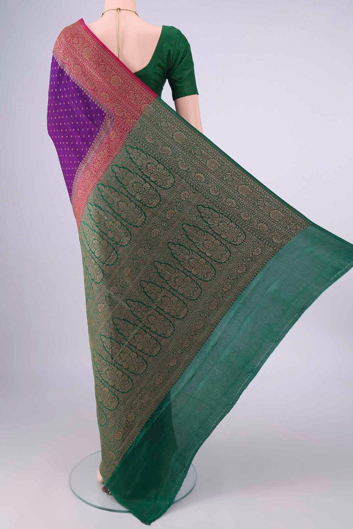 Flat view of Violet Banarasi Georgette Saree with Zari Butta on the body and Ganga Jamuna Border. 