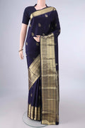 Pure Silk Navy Blue Kanjivaram Saree with Zari Butta on the body and Zari Border.  displayed on a mannequin