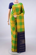 Pure Silk Multi Color Kanjivaram Saree with Checked design on the body and Without Border.  displayed on a mannequin