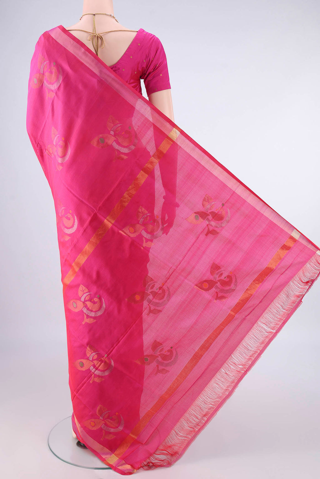 Flat view of Pure Silk Rani Pink Uppada Saree with Jamdani on the body and Zari Border. 