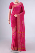 Pure Silk Pink Uppada Saree with Zari And Thread Butta on the body and Zari Border.  displayed on a mannequin