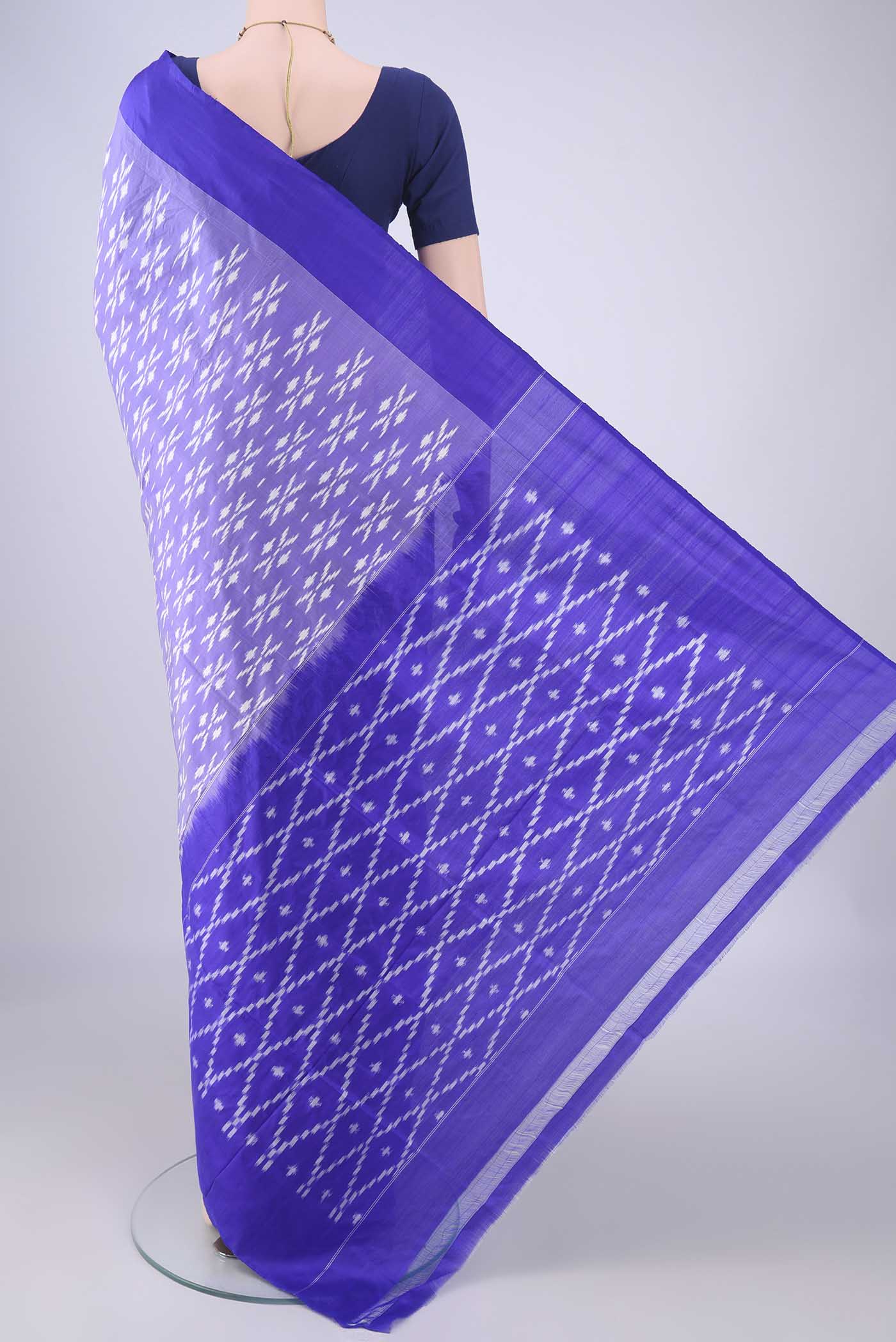 Flat view of Purple Pochampally Silk Saree with Pure Ikat on the body and Plain Border. 