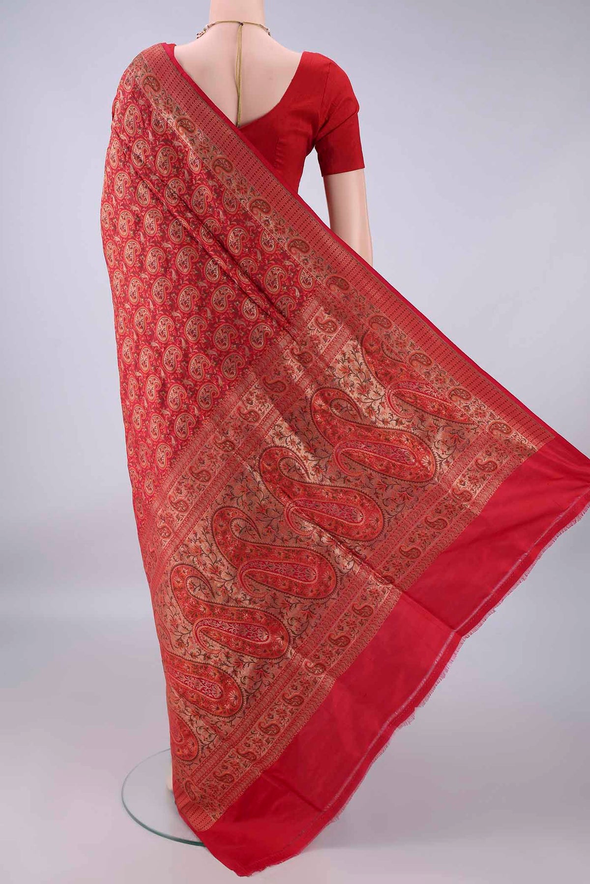 Flat view of Pure Silk Red Banarasi Tanchoi Saree with Jacquard With Zari Butta on the body and Zari Border. 