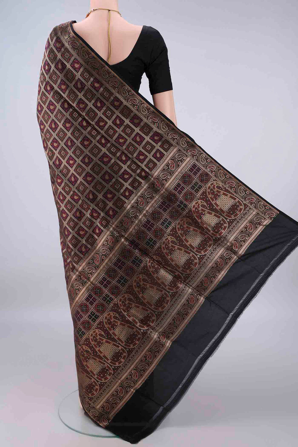 Flat view of Pure Silk Black Banarasi Jamavar Saree with Checked design on the body and Zari Border. 
