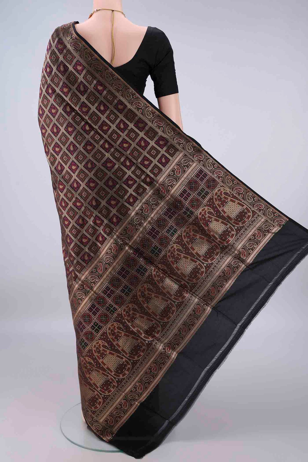 Flat view of Pure Silk Black Banarasi Jamavar Saree with Checked design on the body and Zari Border. 