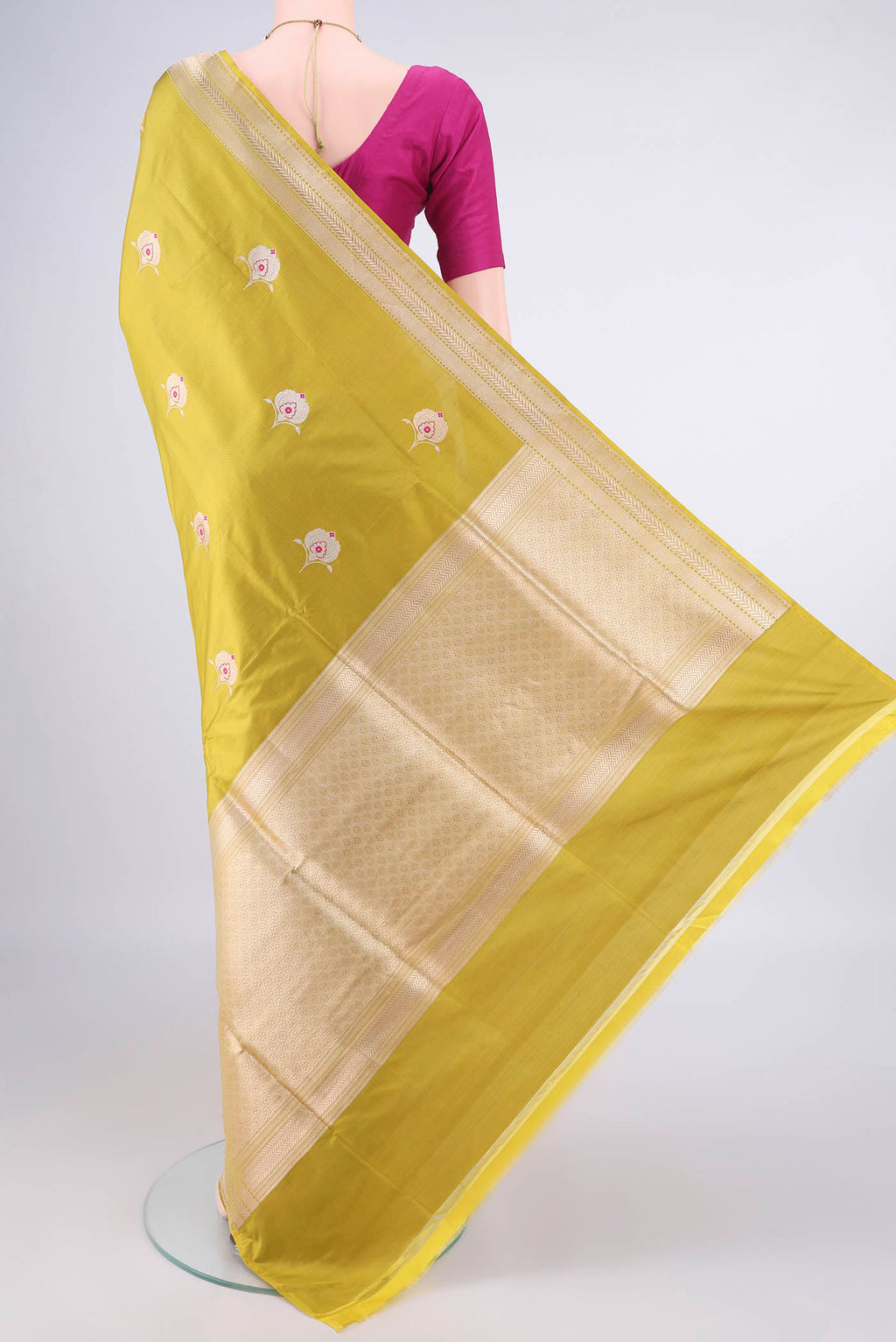 Flat view of Pure Silk Mehandi Green Banarasi Saree with Zari Butta on the body and Zari Border. 