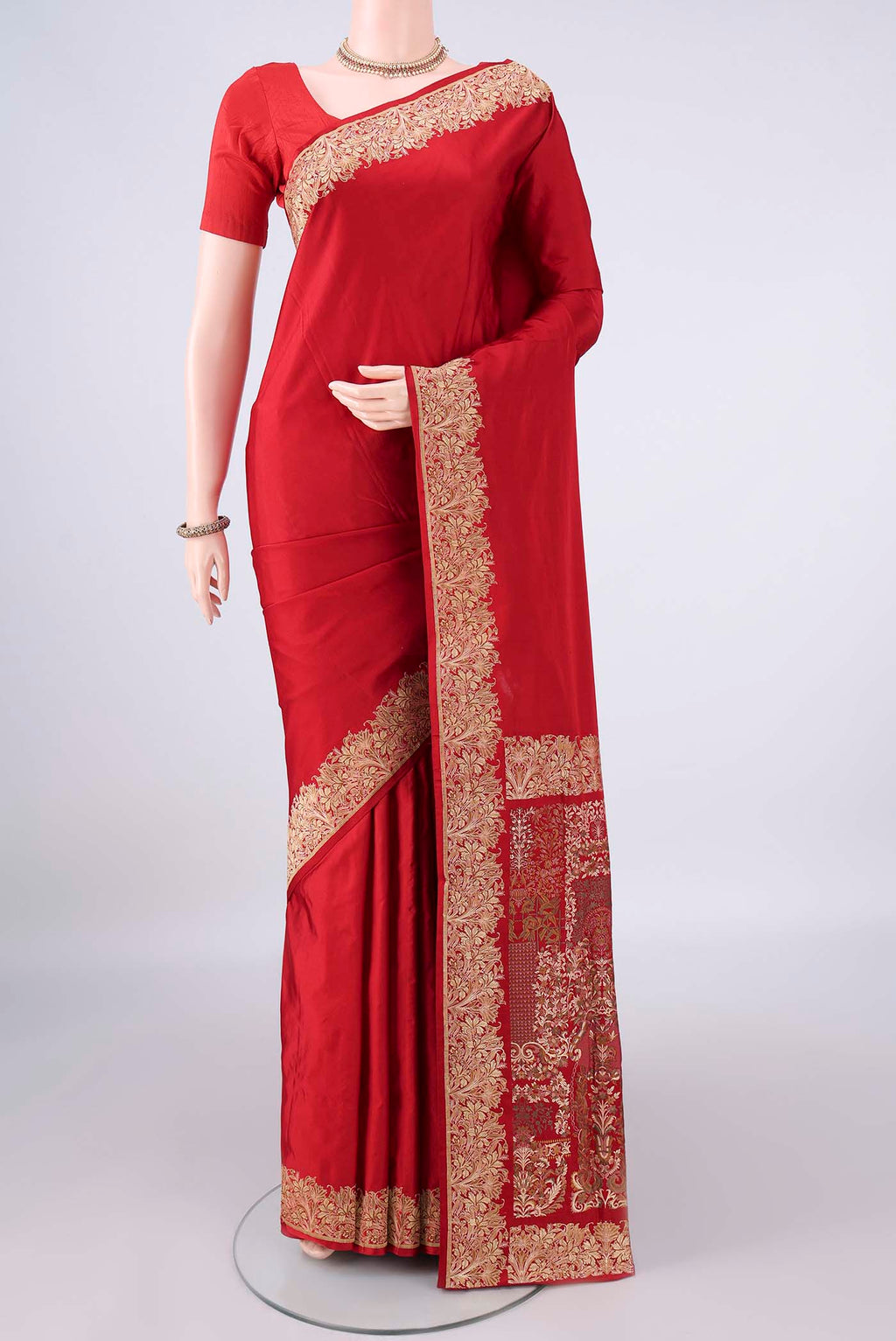 Red Banarasi Jamavar Saree with Plain Body and Thread Border.  displayed on a mannequin